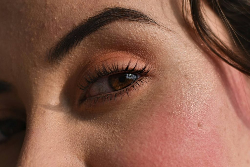 persons eye with blue eyes